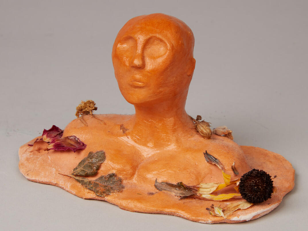 Deadly Feminine, 2021, Crayola Air dry clay and natural flowers